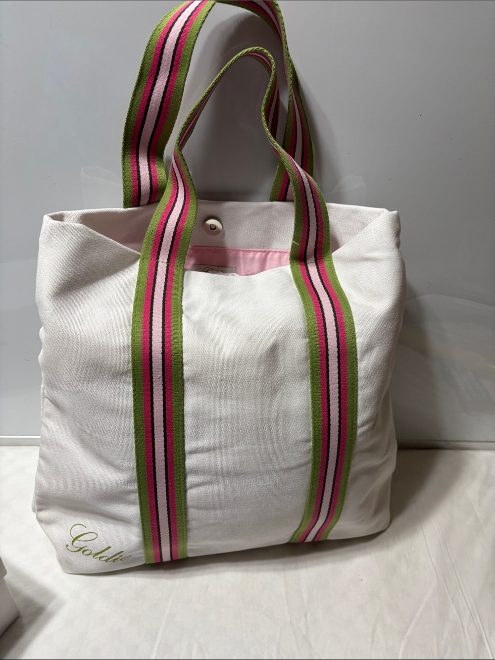 Goldie white with stripe limited edition tote. NWOT